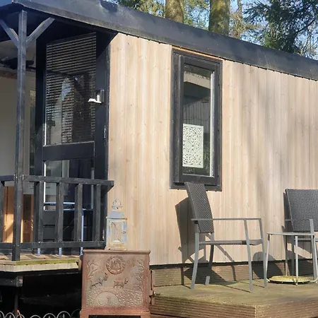 Prázdninový areál Pipowagen Bed Bij Bos *